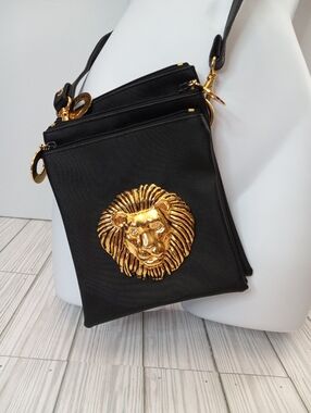 Nima Mini Black Crossbody Bag with Metal Gold Lion Medallion Accent